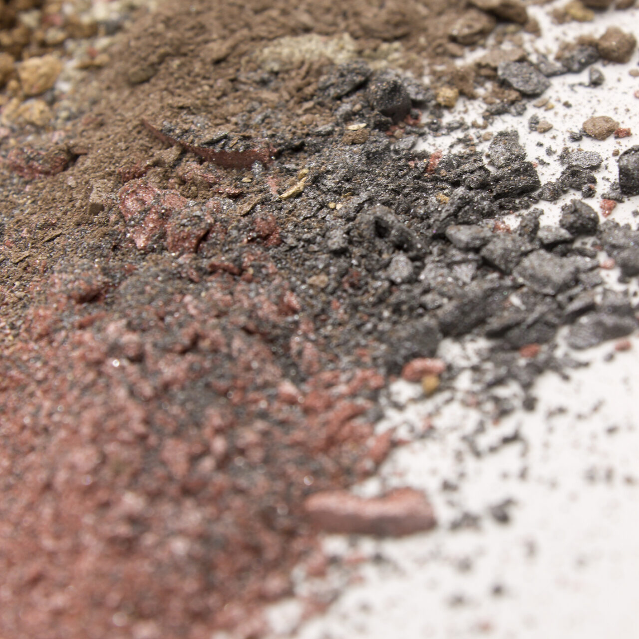 This is a photograph of a colorful powder eyeshadow background